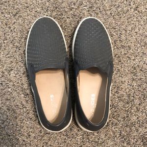 Grey slip on shoes